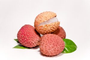 Litchi | Kalorier Tre litchi med blad